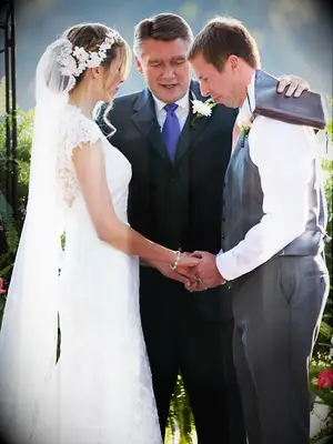 White flower crown with a floor-length veil