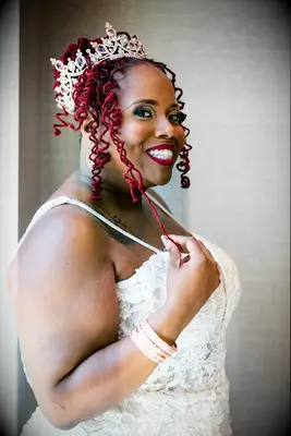 High Bun With Tendrils for your wedding hair inspo