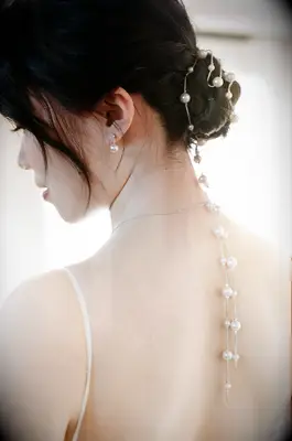 embellished braided low bun for your wedding day inspo