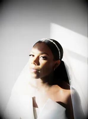 Slicked Back Ponytail with Headband for the best modern wedding day style