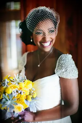 Side Bun with a Short Veil for the best long-hair wedding day styles