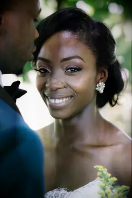 Voluminous up do with side part