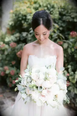 Voluminous updo with slicked bangs