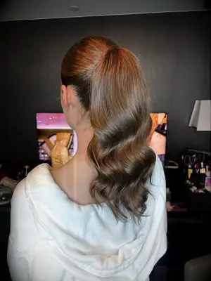 High ponytail with Hollywood waves bridesmaid hairstyle