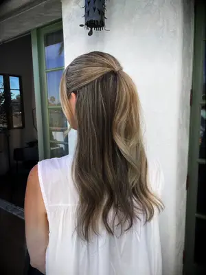 Soft half-up half-down waves bridesmaid hairstyle