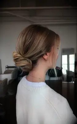 Simple low bun bridesmaid hairstyle