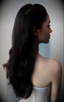 Soft waves with twisted front pieces bridesmaid hairstyle