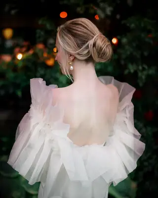 Bride with extension-enhanced bun