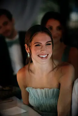 Glossed and bronzed wedding guest makeup look