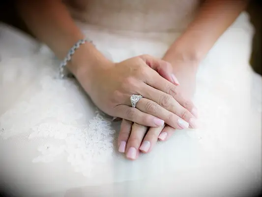 Pink short wedding nails with sparkly accent nail