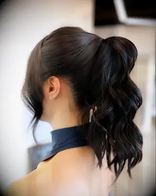Simple curled ponytail wedding hairstyle