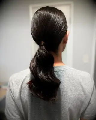 Medium-length ponytail with waves wedding hairstyle