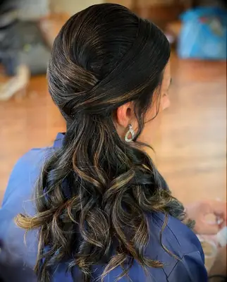 Curled ponytail wedding hairstyle