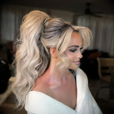 Voluminous high wedding ponytail