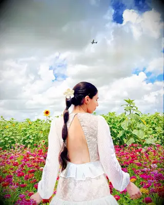 Bubble ponytail with claw clip wedding hairstyle