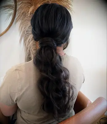 Classic wedding ponytail with curly hair