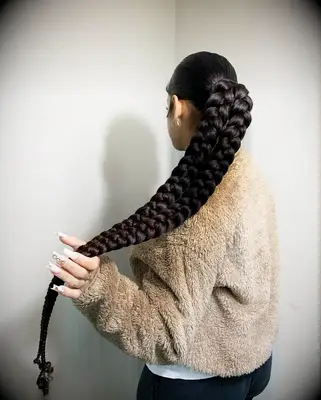 Long double-braided wedding ponytail hairstyle 