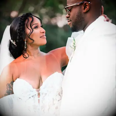 Updo With Braid Crown and Face-Framing Curls