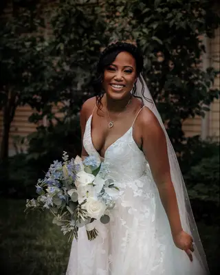 Low Bun With Braid Crown and Face-Framing Curls