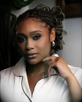 Voluminous Bun With Knotless Braids