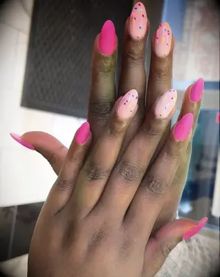 pink nails with sprinkles pattern