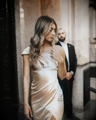 Loose curls one shoulder gown bridal hairstyle