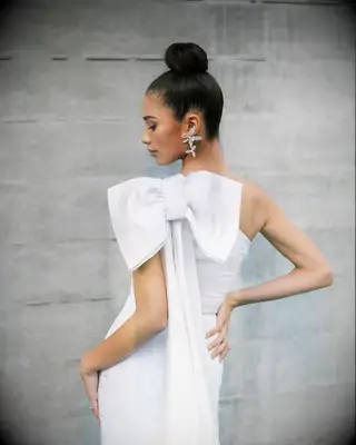 High bun one shoulder bridal hairstyle