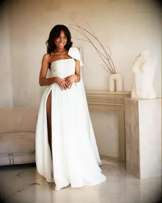 Curtain bands one shoulder gown bride hairstyle