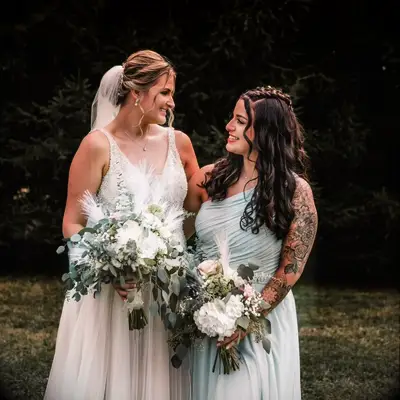 Center braid one shoulder bridal hairstyle