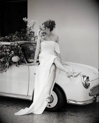 Tousled Bun one shoulder gown bridal hairstyle