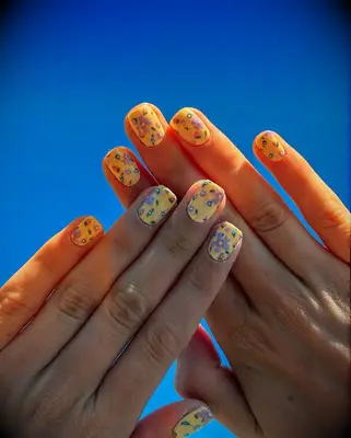 Pastel floral engagement nail inspiration