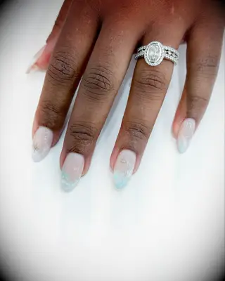 Baby blue wavy french tips engagement nail inspiration