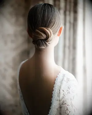 Sleek chignon wedding hairstyle
