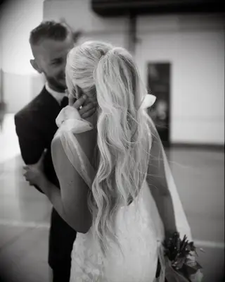 Voluminous ponytail wedding hairstyle