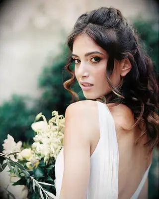 Face-framing curls wedding hairstyle