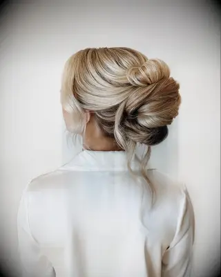 Big, Bold Mid-Height Bun wedding hairstyle