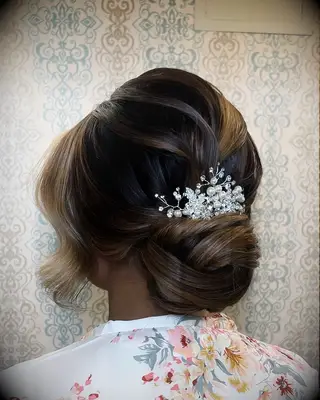 Elegant Textured Low Bun bridal hairstyle
