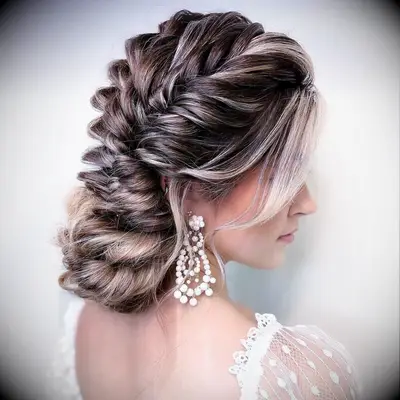 Loose French Braided Side Chignon wedding hairstyle