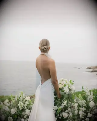 Sleek & Modern Low Bun wedding hairstyle