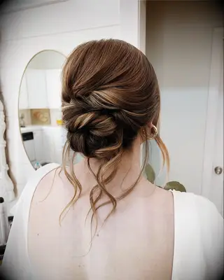 Romantic twist bun wedding hairstyle