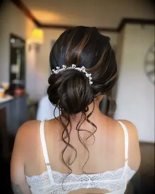 Soft, Textured Low Bun wedding hairstyle