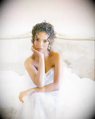 Messy Curly Bun wedding hairstyle