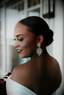 Sleek bun wedding hair trend