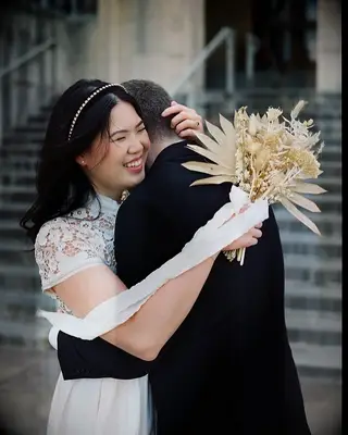 Loose curls high neck dress wedding hairstyle