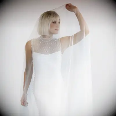 Blunt bo high neck dress wedding hairstyle