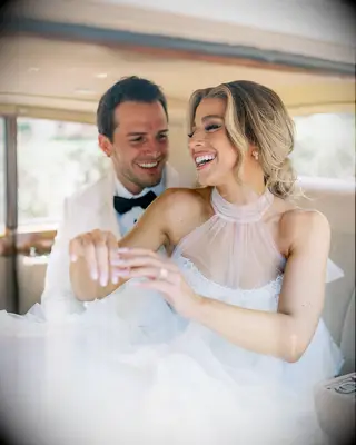 Wavy bun high neck dress wedding hairstyle