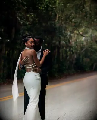 Side swept updo high neck dress wedding hairstyle