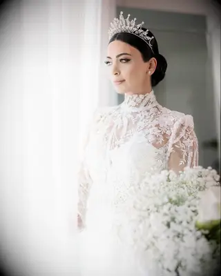 Crowned Chignon high neck wedding dress hairstyle