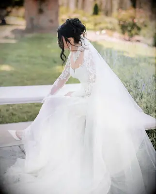 Relaxed updo high neck wedding hairstyle