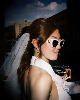 Modern ponytail high neck wedding dress hairstyle